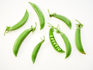 green pea pod on white background