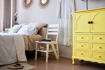 Use of folding stepladder chair in bedroom