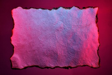 Ancient texture of old writing paper. Vintage grunge paper with dark edges, rainbow colors of interlacing fibers-the background for literary works, language education and library knowledge.