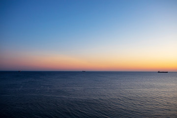 Fototapeta na wymiar beautiful sunset and ship