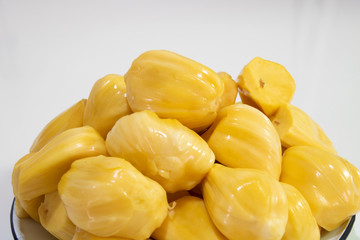jackfruit slices on a plate isolated on white background.