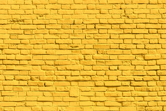 Yellow brick wall, copy space, brick texture, background