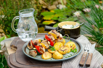Outside grilling shish kebab