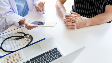 healthcare and medical ethics concept, doctor explains prescription to victim diagnosis  giving a...