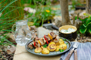 Outside grilling shish kebab