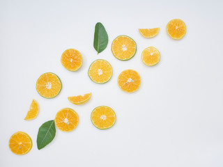 Fototapeta na wymiar Sliced ​​oranges on a white background