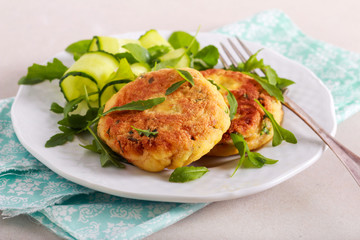 Tuna fishcakes with salad served
