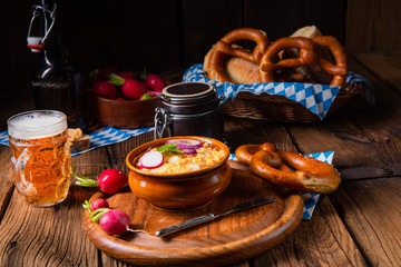 rustic Bavarian obazda with radishes and onions