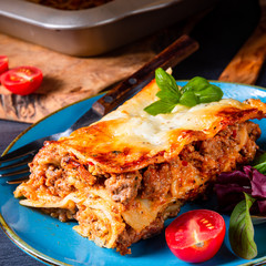 spicy lasagne with tomato sauce and basil
