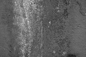 Texture of a concrete wall with cracks and scratches which can be used as a background