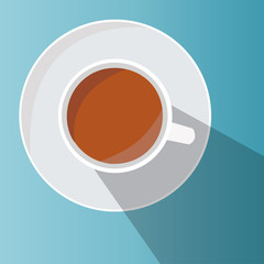 Coffee with milk on a blue table - top view