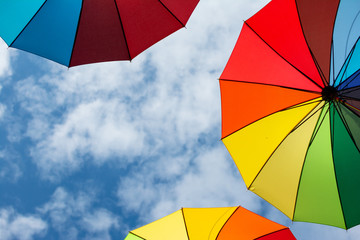 Colorful umbrellas background. Colorful umbrellas in the sky. Street decoration.