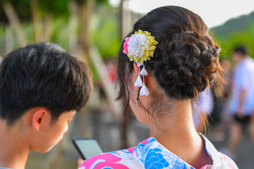 Asian people wearing Japanese traditional kimono clothes at Kiyomizu-dera temple, Kyoto, Japan.