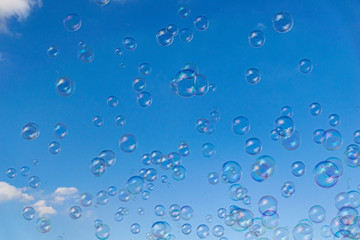 Bubbles floating in the sky on a summers day