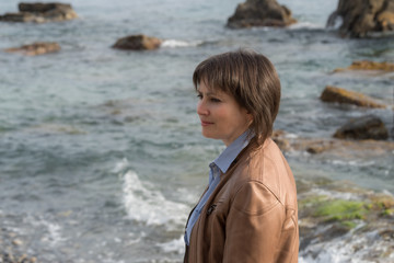 Woman on rocky beach