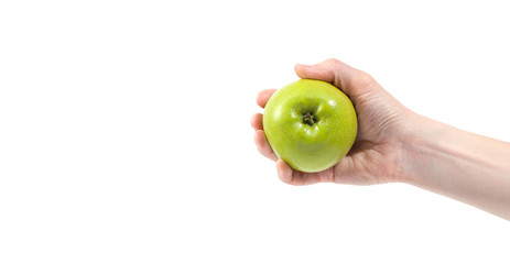 Ripe delicious juicy green apple in hand isolated on white background. Healthy eating and dieting...