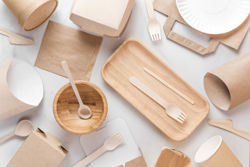 Eco friendly dishes. Disposable paper cups, dishes, fast food containers, wooden bowl and bamboo...