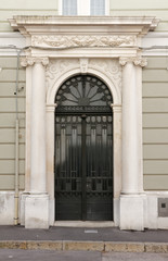 Deocorated Front Door of a Historic Building in Trieste, Italy
