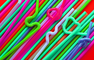 Colour plastic cocktail tubes with a flexible part, due to which they can be twisted into a knot or...