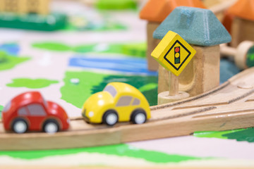 stop road sign - woden Toy Set Street Signs, cars for kids Play set Educational toys for preschool indoor playground (selective focus)