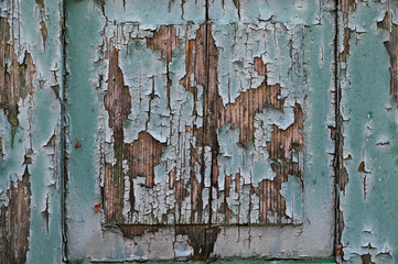 chipped paint on old, wooden door
