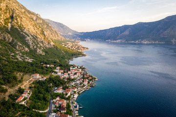 Fototapeta na wymiar Aerial view Harbour and small town at Boka Kotor bay (Boka Kotorska), Montenegro, Europe