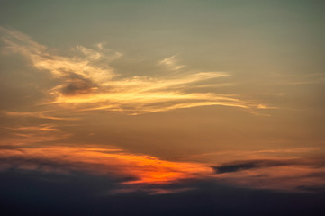 Fototapeta na wymiar Hidden sun Sunset glow clouds sky