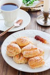 Goose foot cookies with curd on a wooden table, selective focus