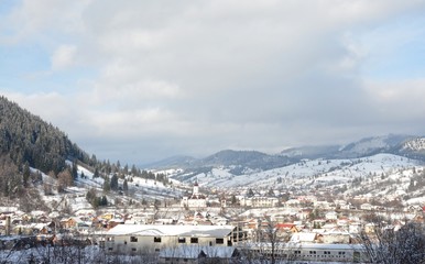Fototapeta na wymiar winter landscape with a village in Bucovina
