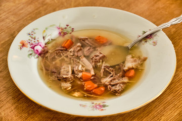 Beef soup on plate