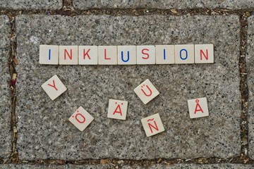 Inklusion (German for: inclusion)