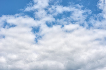 Blue sky with a white clouds, abstract background