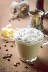 Bulletproof coffee, blended with organic butter and MCT coconut oil, paleo, keto, ketogenic drink breakfast.