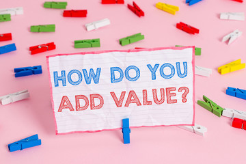 Text sign showing How Do You Add Value Question. Business photo text improve work undertaking production process Colored clothespin papers empty reminder pink floor background office pin
