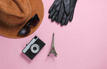 Jorney to Paris. Women's accessories (hat, gloves, sunglasses), retro camera, figurine of the...