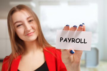 Business, technology, internet and networking concept. Young entrepreneur showing keyword: Payroll
