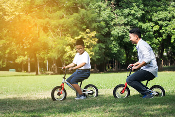 Family.Happy farther with a boy having fun in the park.