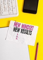 Text sign showing New Mindset New Results. Business photo text obstacles are opportunities to reach achievement Crumpled white paper on table with paper clips clock mobile and pc keyboard
