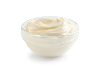 Delicious mayonnaise sauce in bowl on white background
