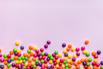 Colorful Candy bonbon snack set. Sweet pink background. Top view, flat lay
