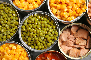 Open tin cans of conserved products, top view
