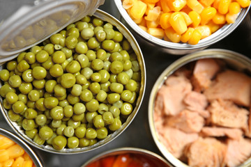 Open tin cans of conserved products, top view