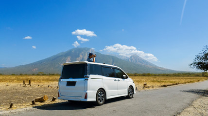 Photographer taking photos Baluran mountain view