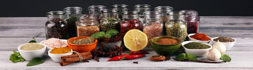 Fototapeta na wymiar Spices and herbs on table. Food and cuisine ingredients with pepper