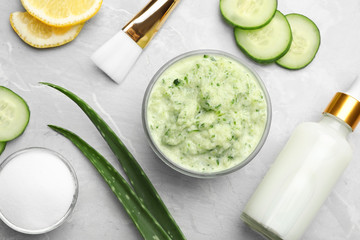 Handmade face mask and ingredients on light marble table, flat lay