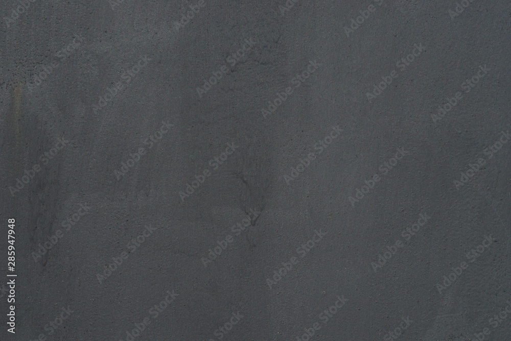 Wall mural black painted metallic wall texture background