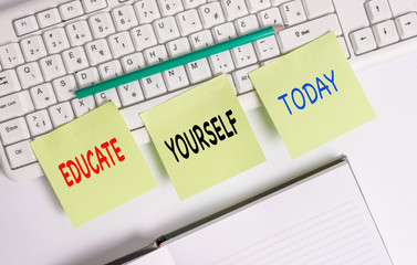 Word writing text Educate Yourself. Business photo showcasing prepare oneself or someone in a particular area or subject Three empty green square papers by the pc keyboard with copy space