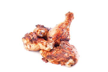 grilled chicken legs isolate on a white background