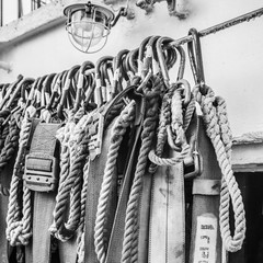 Safety belts on a sailboat, close-up. Black and white photo