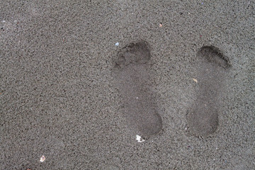 Footprints on the sand on tropical beach